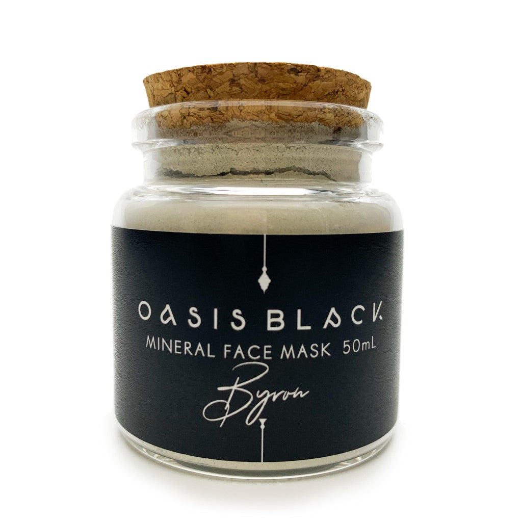 50ml glass jar with cork lid labelled with Oasis Black Mineral Facial Masque in Byron. Byron is a stormy turquoise coloured mask activated with water and featuring French Green Clay, Spirulina, Blue Butterfly Pea Flower, Lemon Myrtle and Black Seeds. Available exclusively from Oasis Black - makers of All Natural and Organic Botanical Skincare featuring Black Seeds (Nigella Sativa). Handmade in small batches to waterless formulations in the Byron Bay Hinterland. 